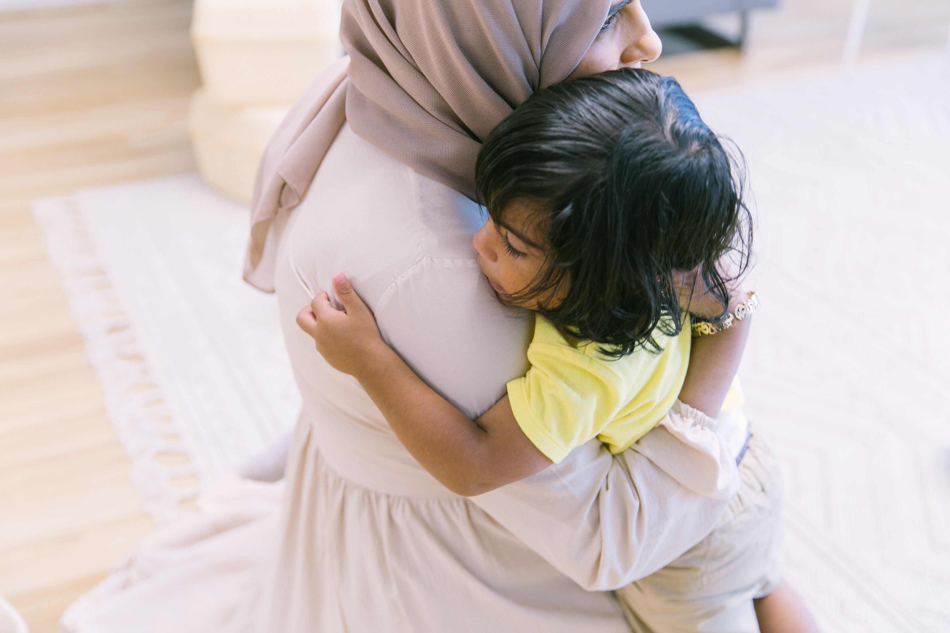 Toddler experiencing separation anxiety, learning to cope with short separations and building independence.